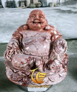 Tượng Phật Di Lặc Nhỏ Đá Đỏ Đặt Tại Bàn Thờ Thần Tài